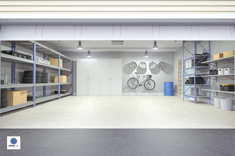 Garage con scaffalature, pavimentazione grigia - Garage: come arredarlo con banchi da lavoro?